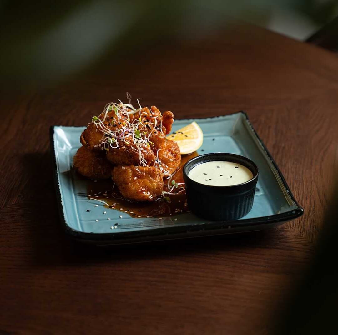 fried chicken served with Rocca cheese dip
