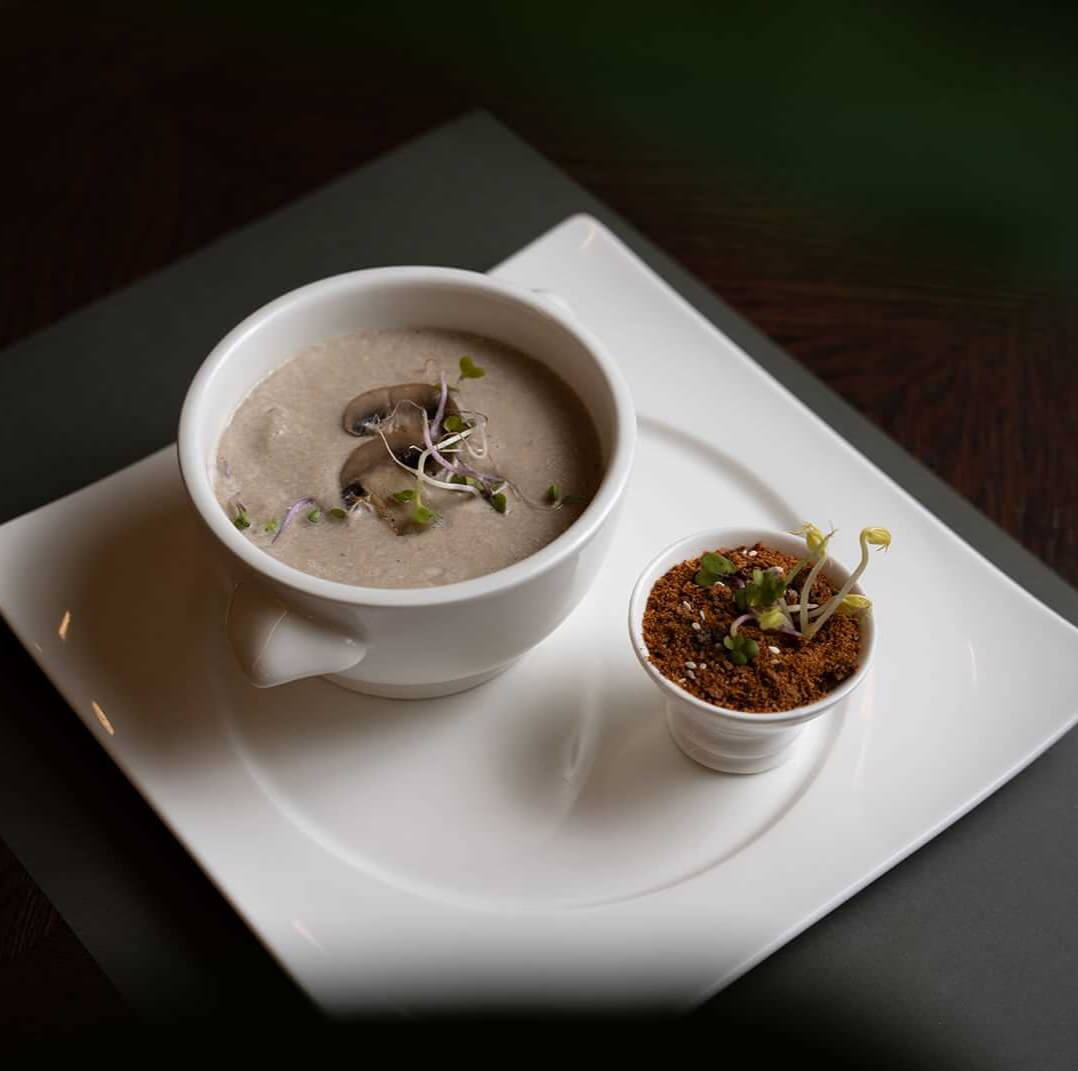 A rich blend of mushrooms, served in a warm, comforting broth